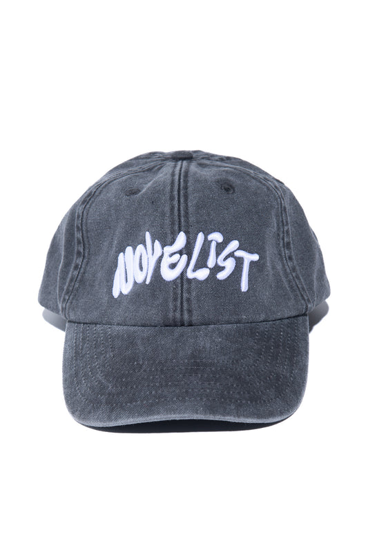 Designed by Novelist Studios to create a perfect baseball cap. Exclusive Novelist logo. Black/white front 1