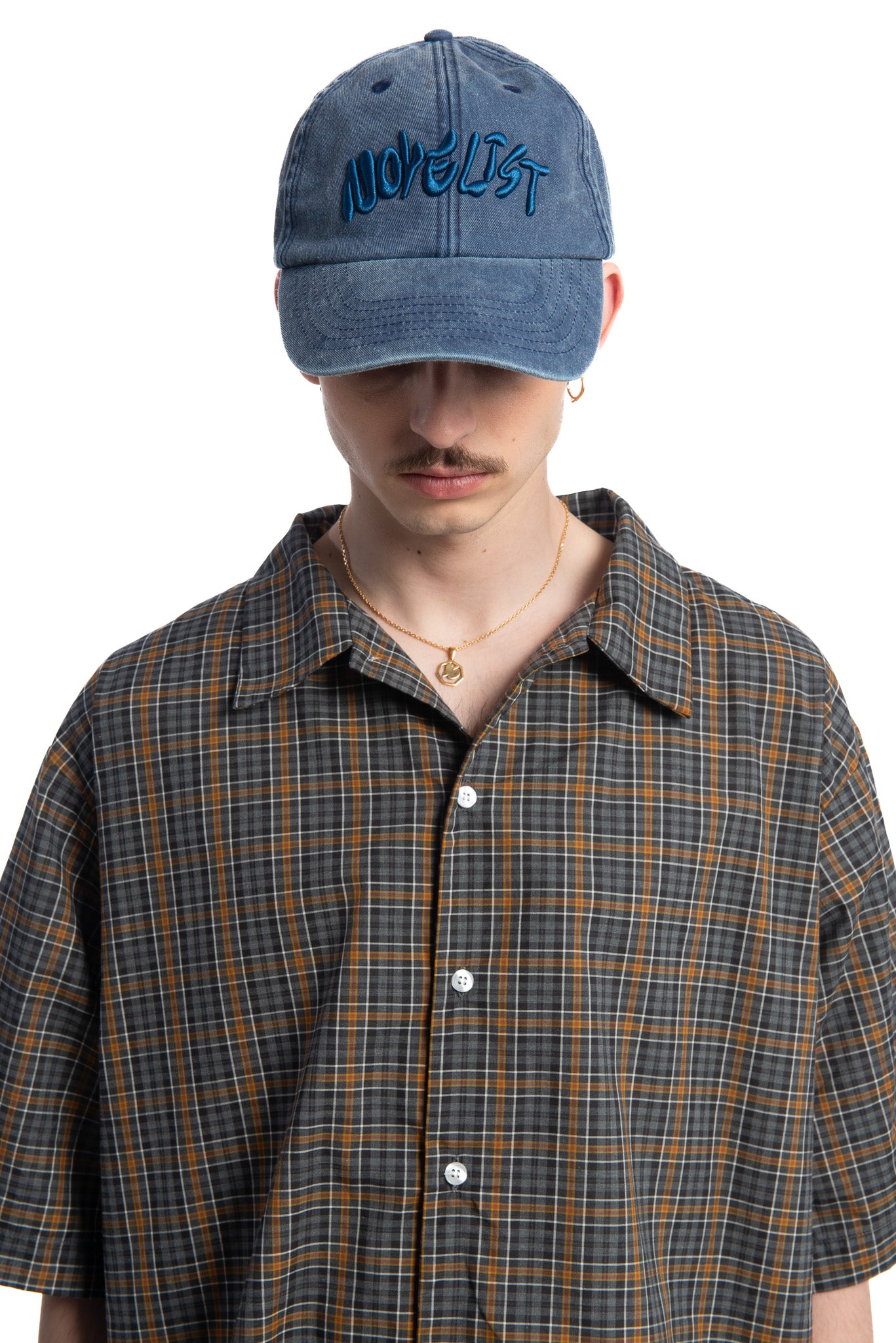 Designed by Novelist Studios to create a perfect baseball cap. Exclusive Novelist logo. Side Blue/Blue 42