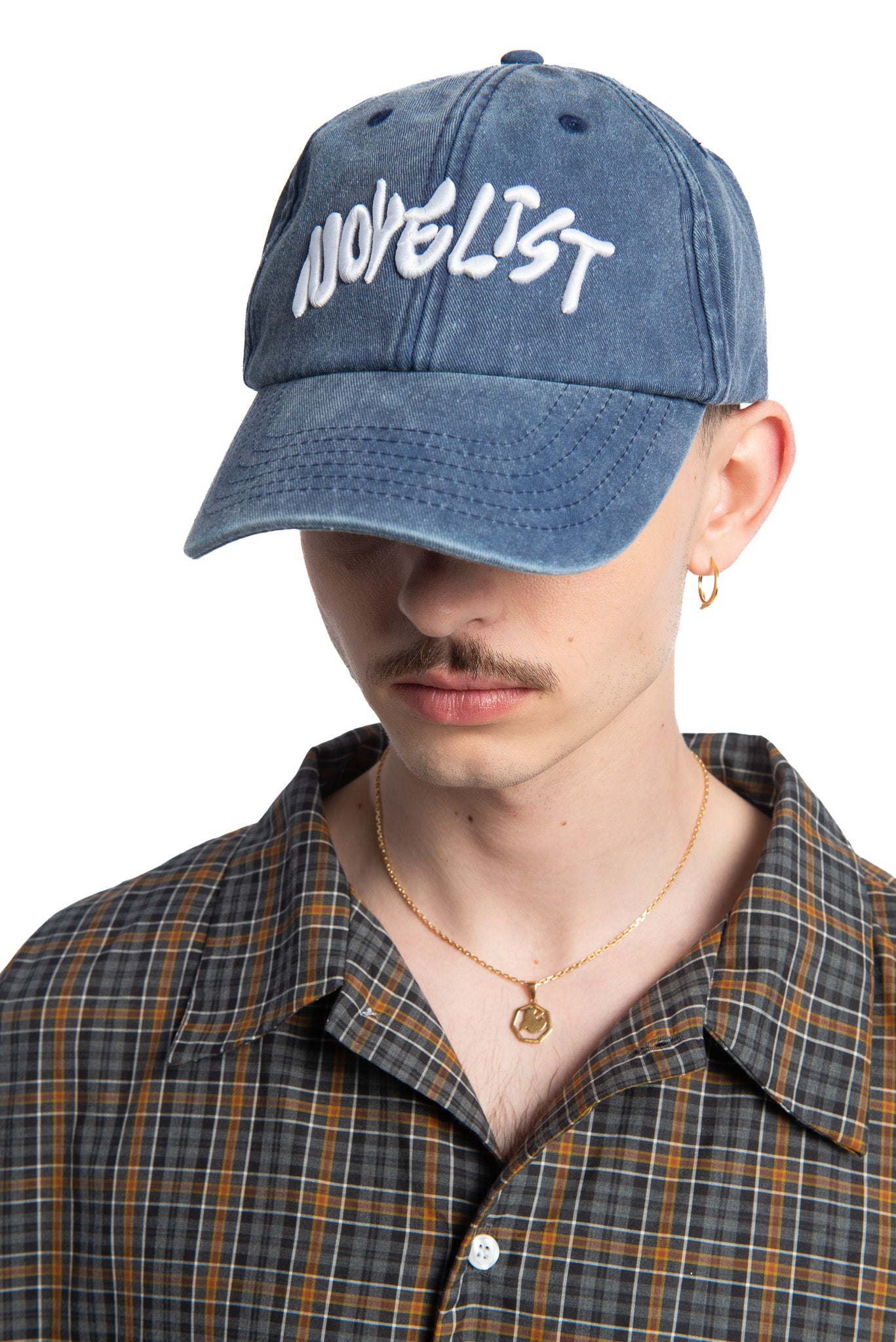 Designed by Novelist Studios to create a perfect baseball cap. Exclusive Novelist logo. Side Blue/white 2