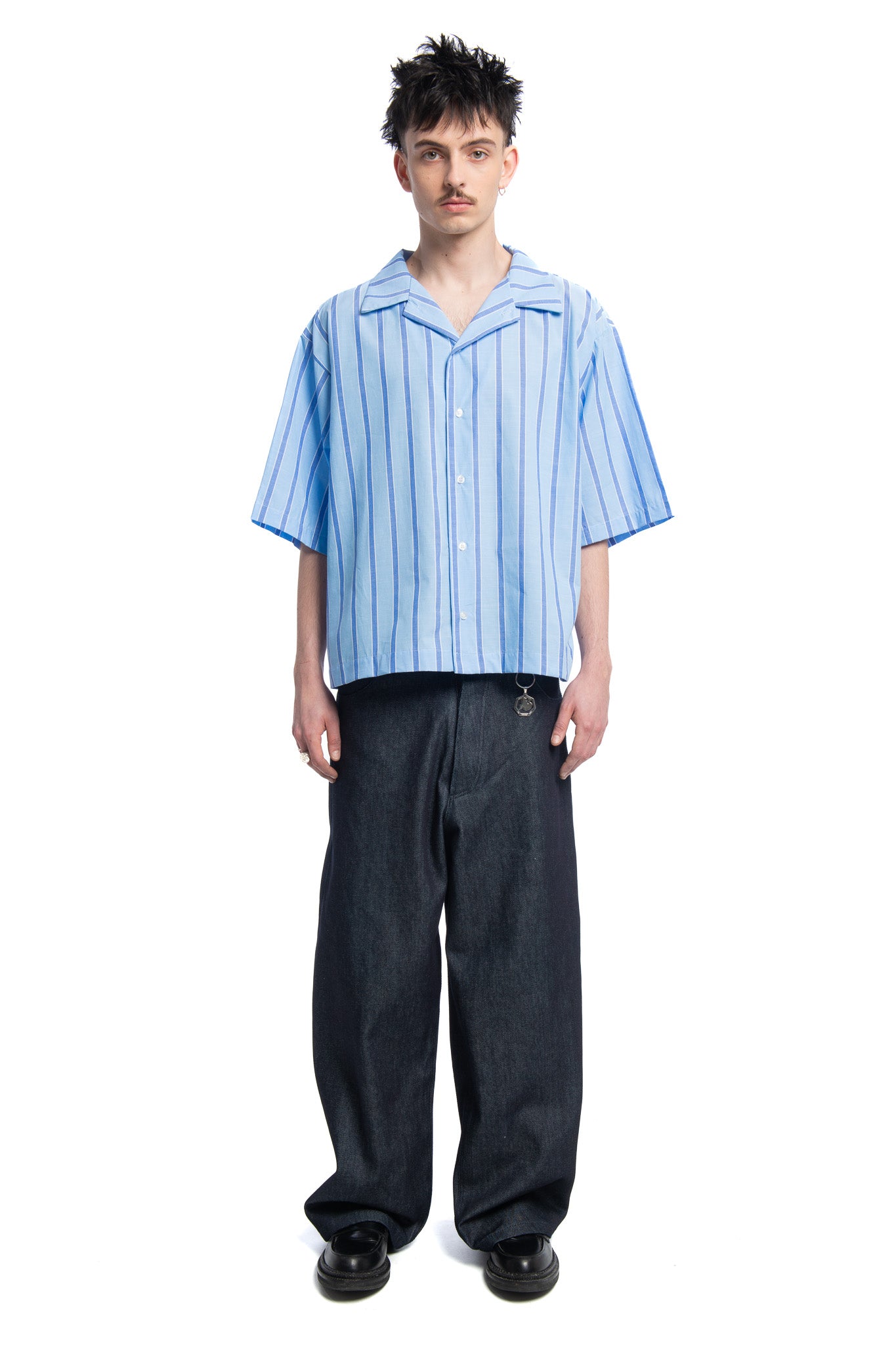 Designed by Novelist Studios to create a perfect bowling fit.  - Blue  - 100% Cotton  - Wash at 30° gentle cycle | Tumble drying Low temperature | Iron at medium temperature | (F) Professional cleaning with hydrocarbon solvents only | Do not bleach 2