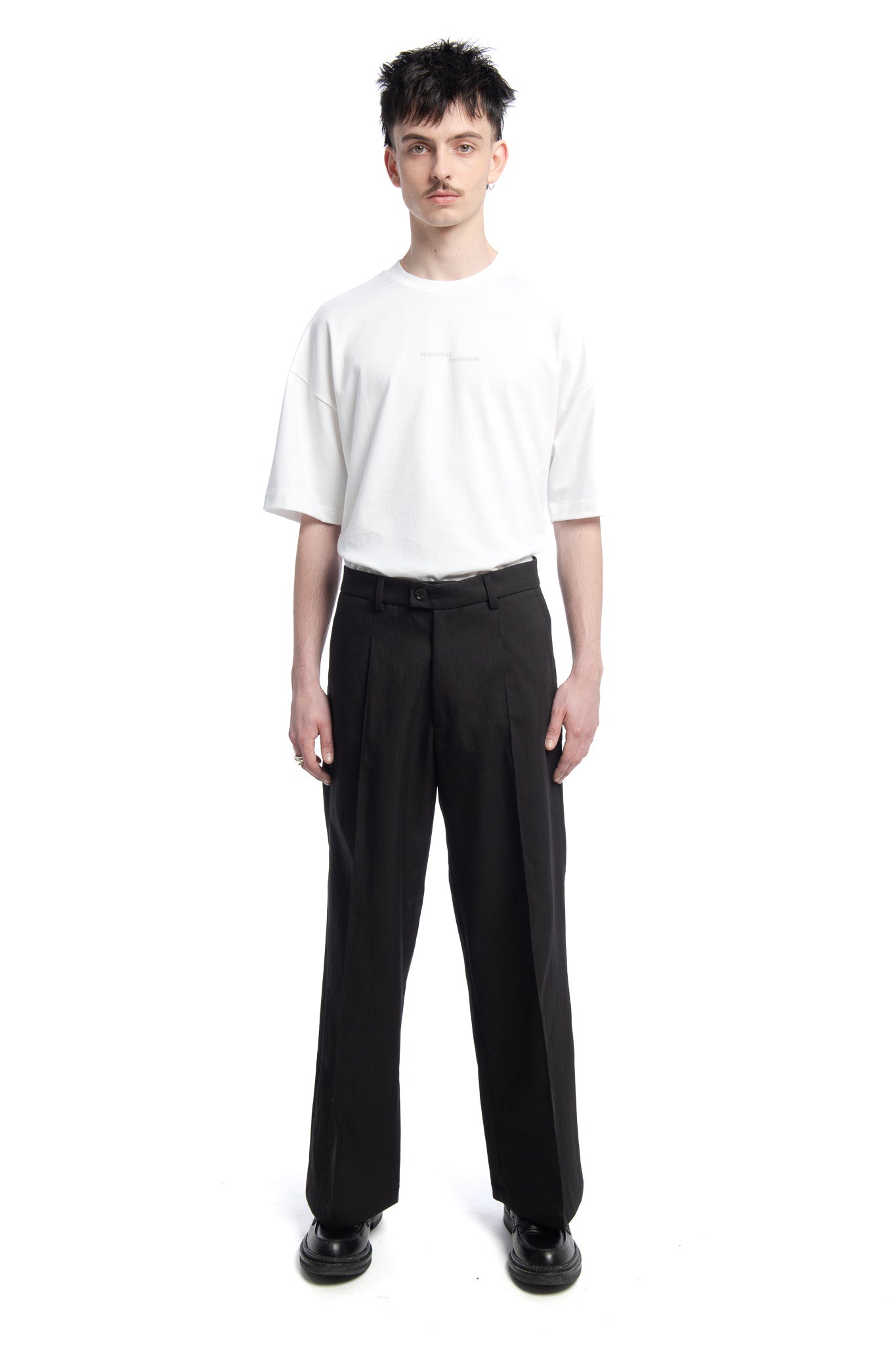 Designed by Novelist Studios to create a perfect tailor pants.  - 62% Cotton, 38% Polyamide  - Do not Wash | Do not tumble dry | Iron at low temperature | (F) Professional cleaning with hydrocarbon solvents only | Do not bleach 1